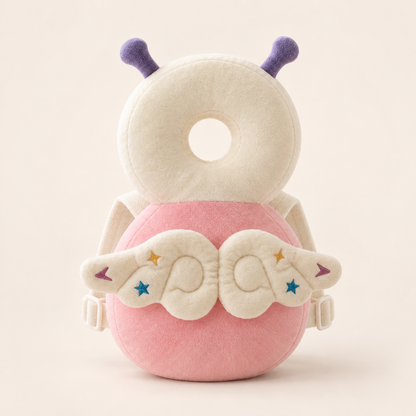 Elfin baby cushion backpack with pink body, ivory ring and embroidered wings on a cream background