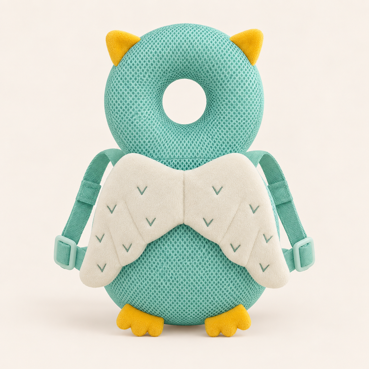 owl baby cushion backpack on a warm cream background